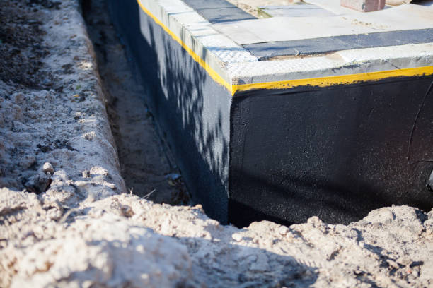 Professional Exterior Waterproofing technician working in Aberdeen, NC